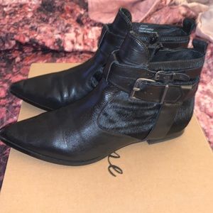 Flat black pointy toe ankle boots